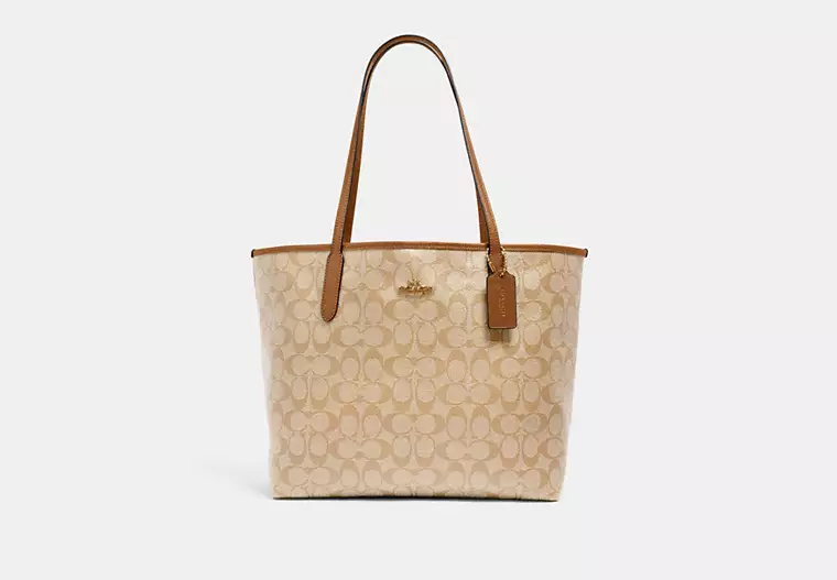 Coach City Tote Bag In Signature Canvas Lt Khaki Lt Saddle